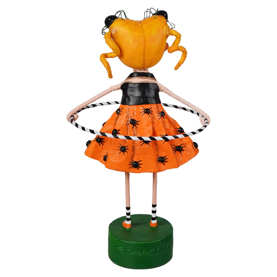 Orange pumpkin-headed lori mitchell halloween doll wearing black and orange spider dress with striped hula hoop from dolly’s creepy crawlies
