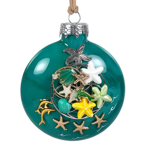 Teal glass dolphin and starfish ornament embellished with colorful metallic starfish and seashells bette fraser day