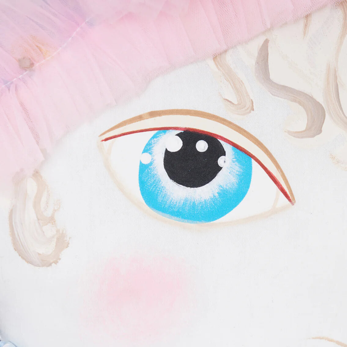 Donna mae zombinaland decorative pillow with a painted blue eye, brown eyelids, and red inner lining by tracy scheff