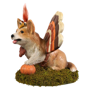 A whimsical tommy corgi figurine with turkey wings and feathered crest in tan white and orange by bethany lowe
