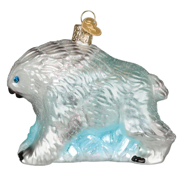 Dungeons & dragons snowy owlbear ornament in silver and light blue glass with textured fur and gold heart loop for tabletop decor