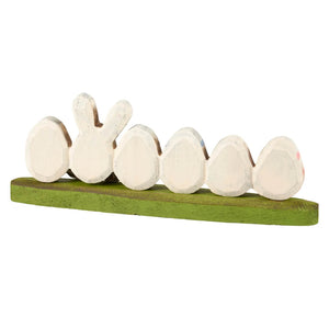 White wooden easter bunny tabletop decor with bunny and five egg shapes on green base perfect for spring display