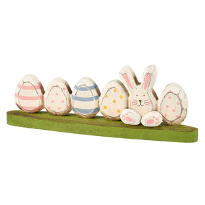 Easter bunny tabletop decor featuring colorful eggs sitter in pastel tones for festive spring decoration