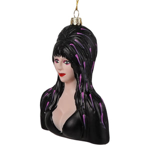 Black glass ornament by cody foster featuring elvira mistress with long black hair and purple streaks bold red lips