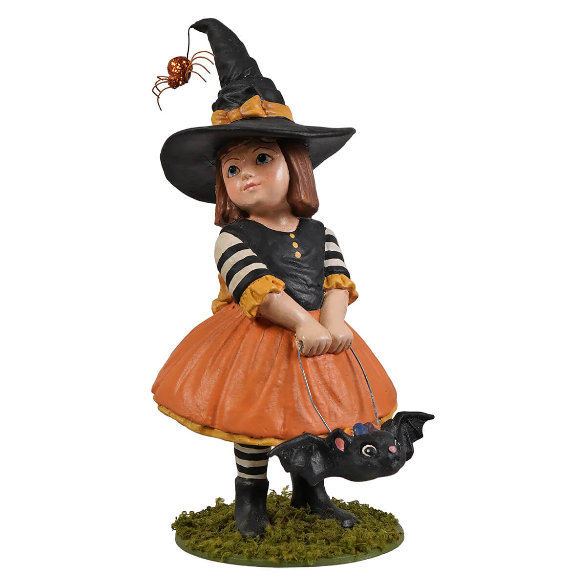 A detailed emery witch figurine with orange skirt black hat and bat perfect for halloween witches decor