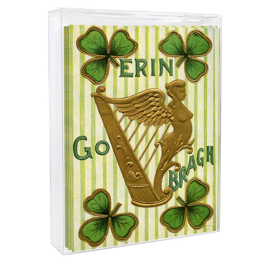 Golden harp with a winged figure and shamrocks on a striped background.