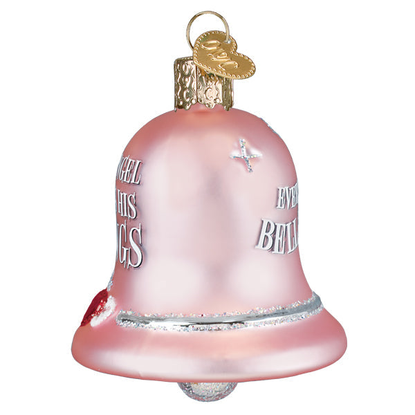 A delicate pink glass vintage bell ornament with silver lettering and a gold heart tag for world christmas decor