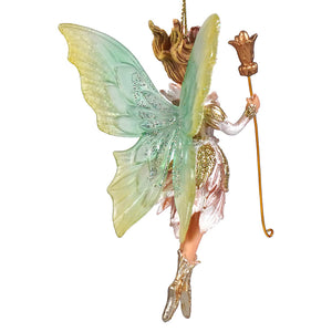 Delicate fairy queen ornament with translucent green and yellow wings gold glitter accents holding a golden tulip staff