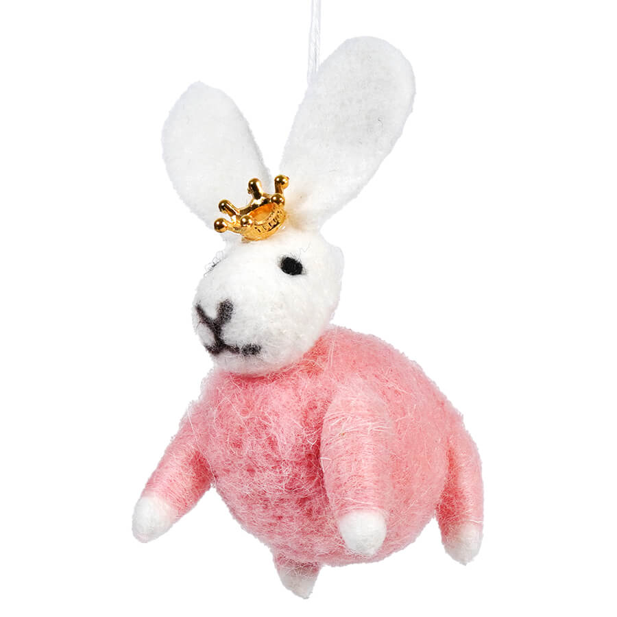 White felt bunny wearing a pink sweater and tiny gold crown.