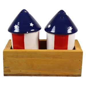 A ceramic american flag-themed figural decor pepper shakers set with red white stripes and navy blue star tops