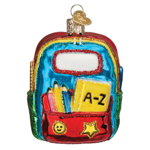 Colorful glass first day of school ornament backpack with glittery details perfect for tabletop decor or figural decor