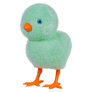 Mint green plush duckling with orange feet and beak.