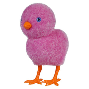 Pink fluffy toy chick with orange feet and a blue eye.