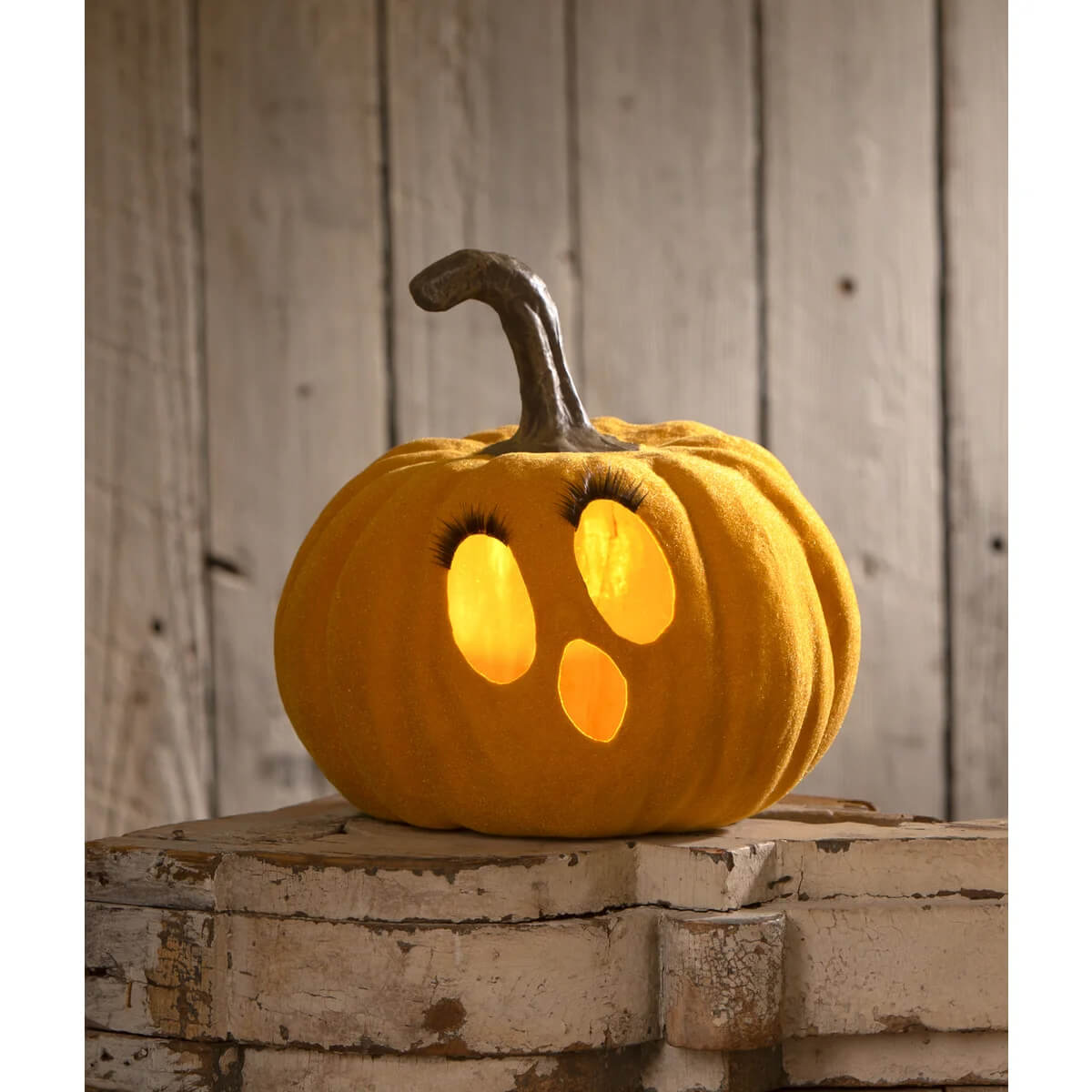 Orange bethany lowe flocked mustard jol pumpkin with plush texture and black faux eyelashes tealight product number visible