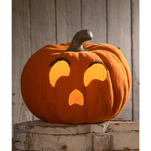 Orange plush pumpkin with embroidered eyelashes and glowing face flocked orange jol by bethany lowe tealight product number