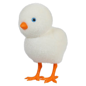 White plush baby chick with bright orange feet and beak.