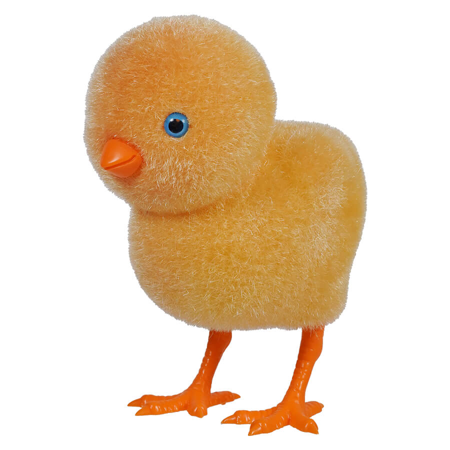 Fluffy yellow toy chick with orange feet and a blue eye.