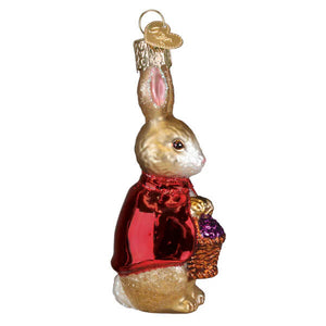 A golden glass flopsy ornament easter bunny wearing a shiny red coat holding a basket with purple eggs perfect easter ornaments