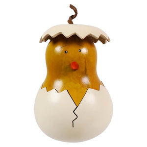 A charming hand-painted chick gourd with a glossy amber body and cracked white shell in flora hen design