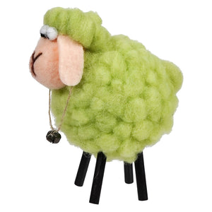 Lime green decorative sheep with black legs and a small bell.