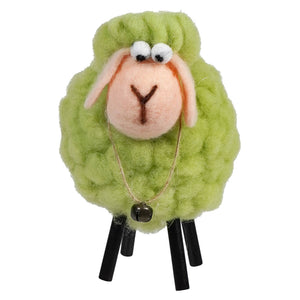 Cute plush sheep toy with lime green wool and black stick legs.