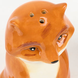Orange ceramic fox salt shaker with glossy finish and white underbelly from forest friends salt and pepper set
