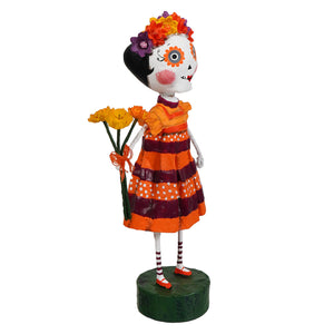 Freida sugar skull figurine in vibrant orange and maroon striped dress with white polka dots for lori mitchell halloween decor