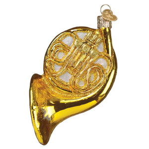 Golden glass french horn ornament with intricate detailing and metallic loop perfect for world christmas decor