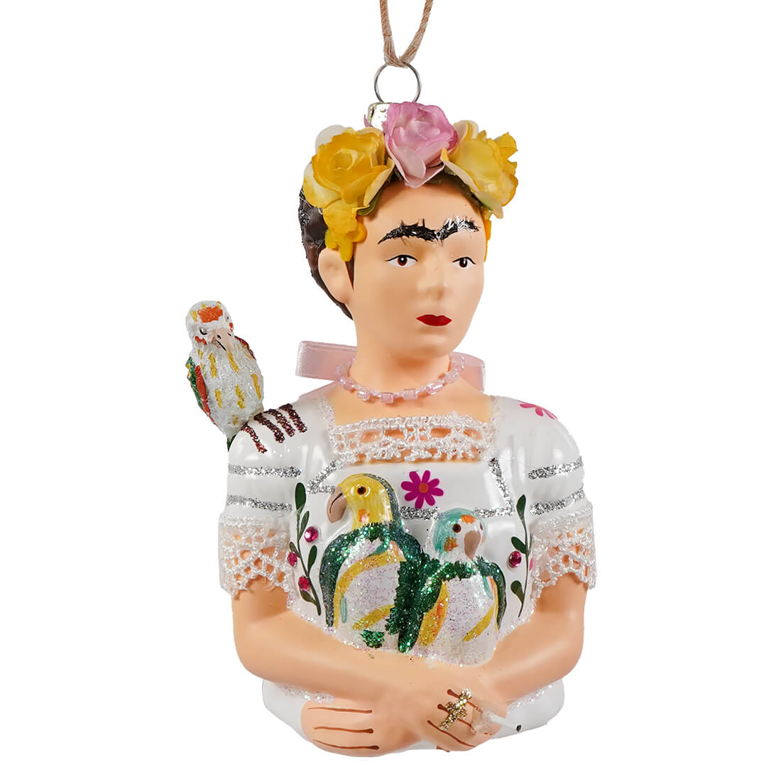 Translucent glass frida kahlo ornament with yellow pink flowers and glittery parrots in white lace dress