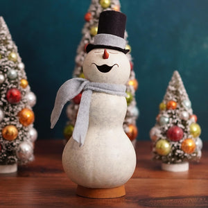 A cheerful white felt snowman gourd with black top hat and gray scarf from meadowbrooke large snowman collection