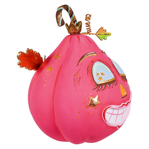 A fulfilled hot pink pixie pumpkin ornament featuring a whimsical pink pumpkin with gold stars glittery lashes and candy cane handle