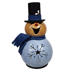 A cheerful meadowbrooke gourds miniature snowflake snowman gourd with tan head blue scarf and top hat with white berries