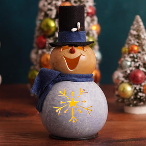 A charming meadowbrooke gourds miniature snowflake snowman lantern with gray base gold star design and black top hat