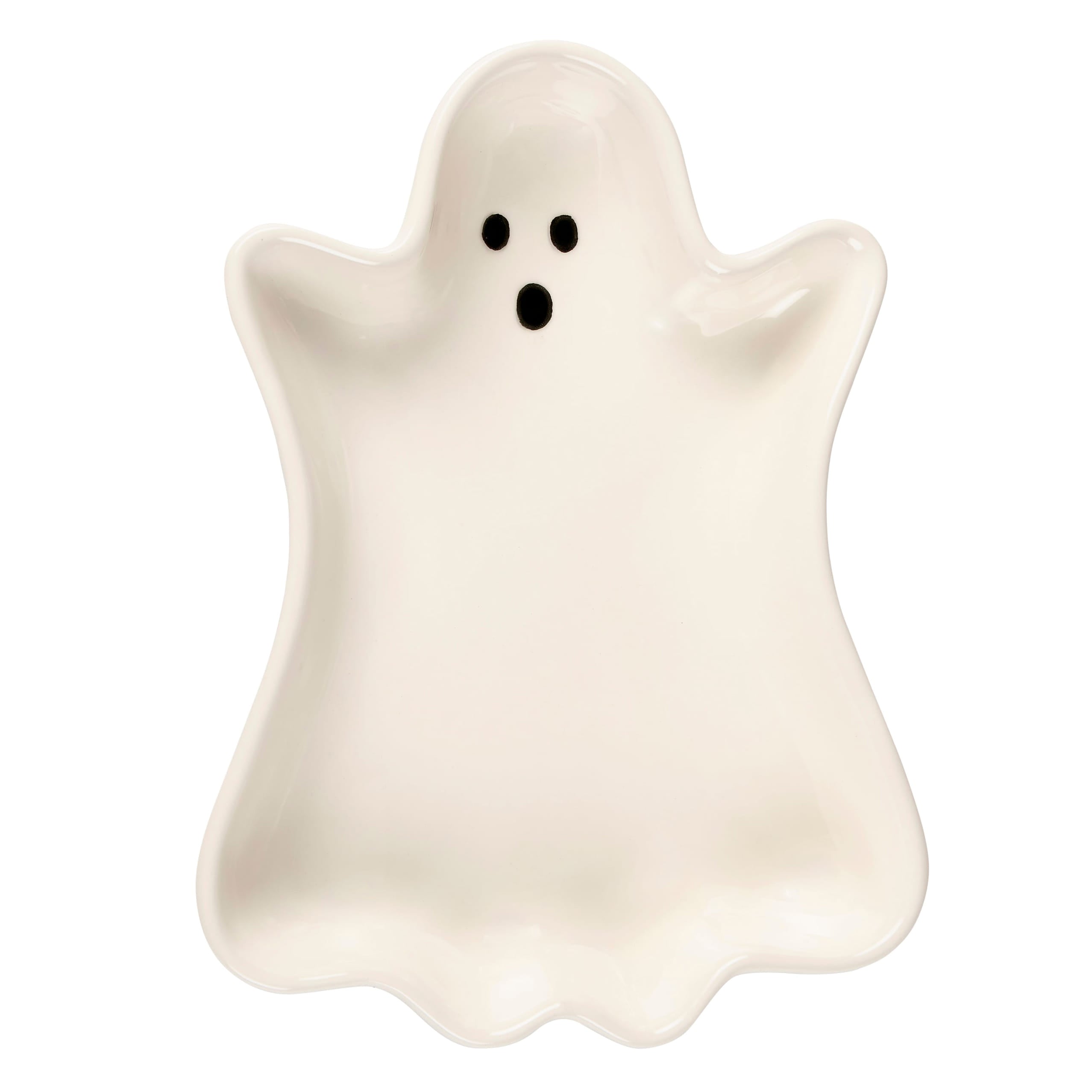 A white ceramic ghost tray with black dot eyes and mouth in a ghost shape perfect for halloween décor