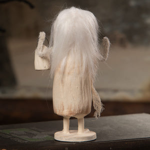 A whimsical white ghostly grace figurine with shaggy fur hair and textured dress for halloween ghost figures decor