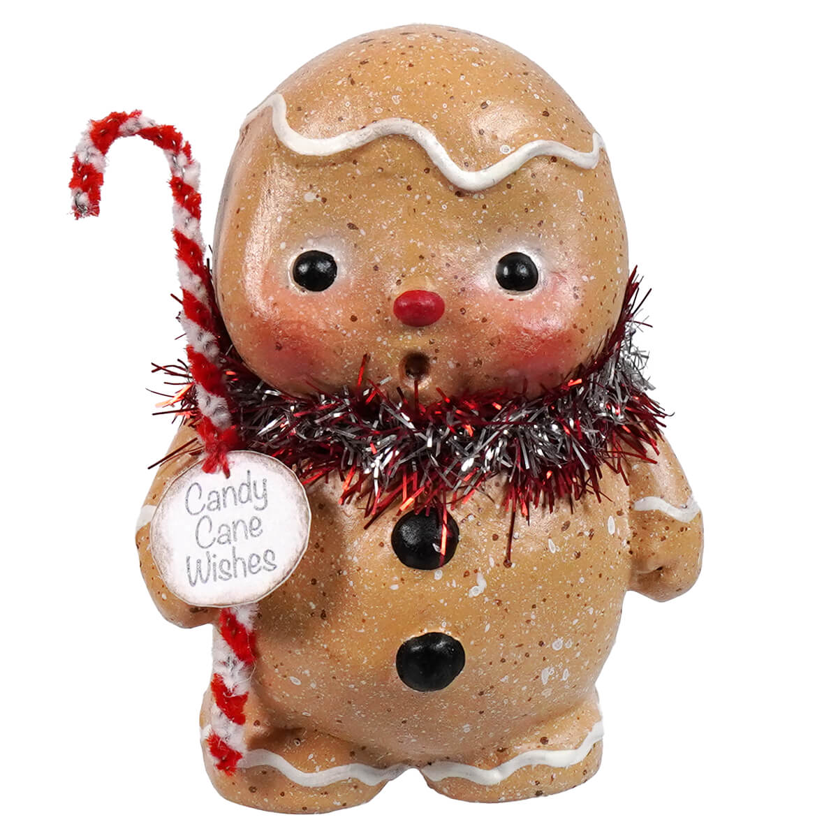 A charming gingerbread boy figurine with speckled tan body white icing black eyes holding candy cane spreading holiday cheer