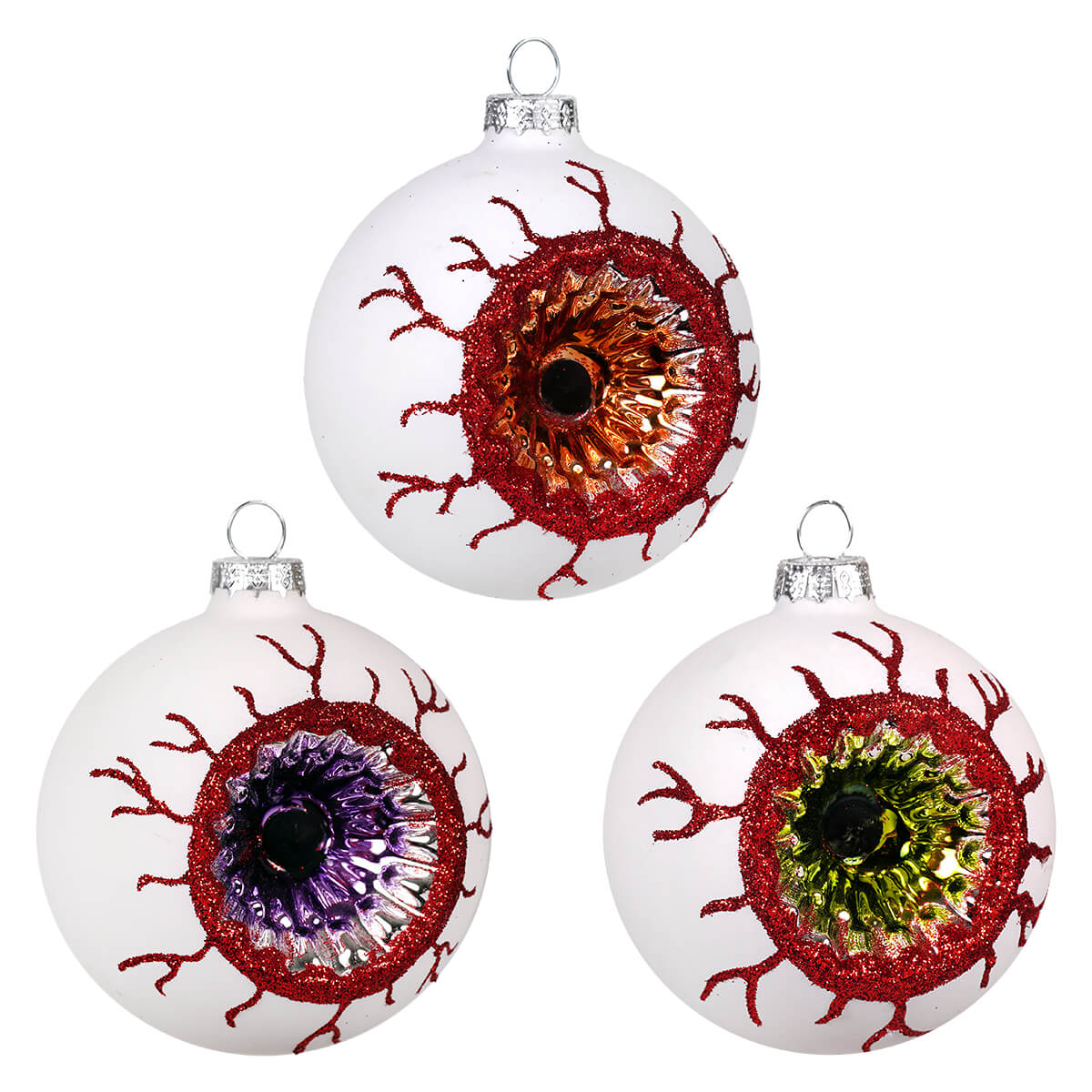 Three glass halloween eye ball reflector ornaments with red veins and colorful irises in orange purple and green