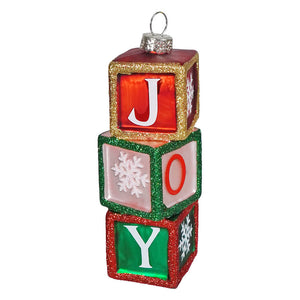 Stacked glass joy gift box ornament with glittery gold green red edges and white letters on translucent panels