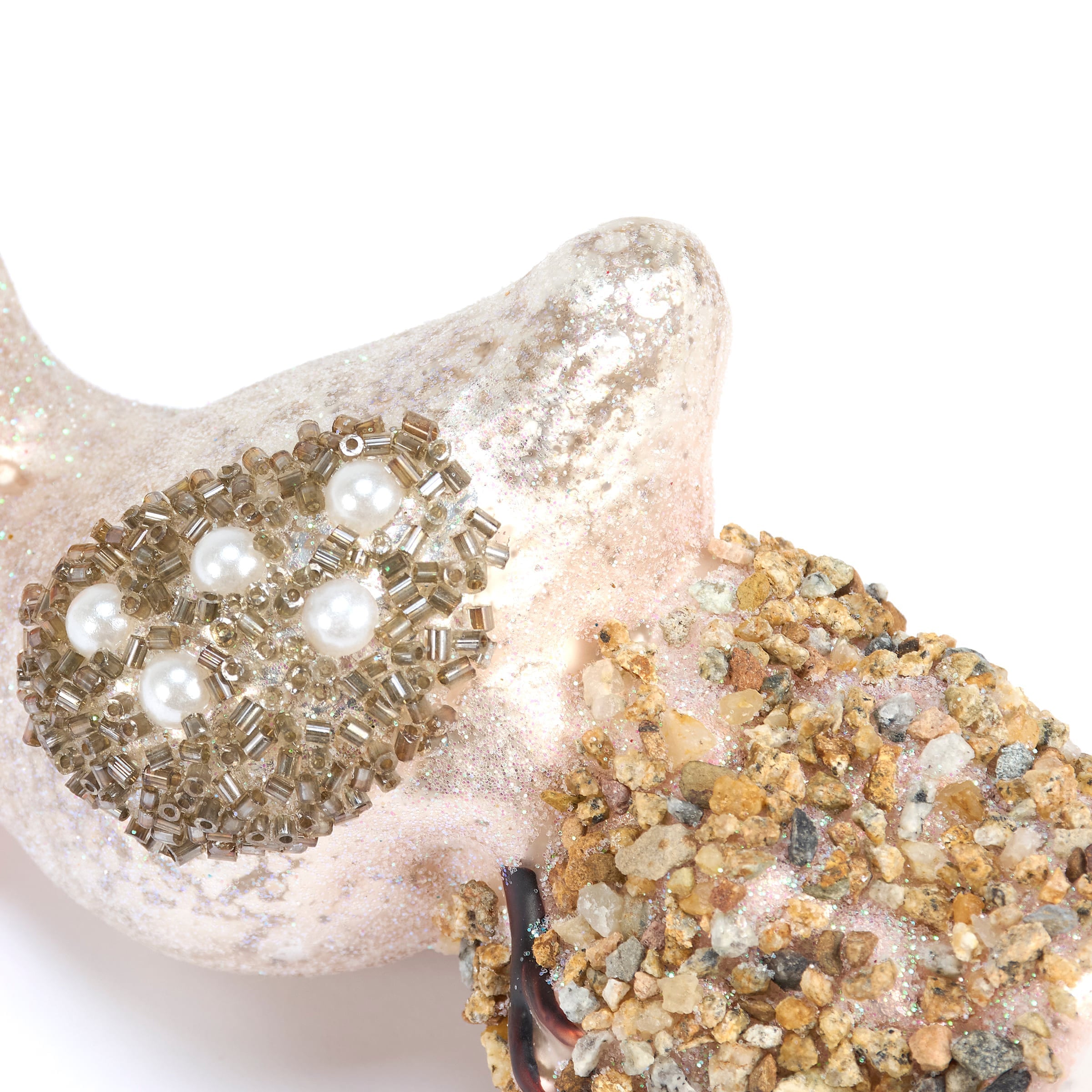 Glass pelican ornament made of glittery pink resin with gold beads and pearls, perfect for sea and beach themed ornaments
