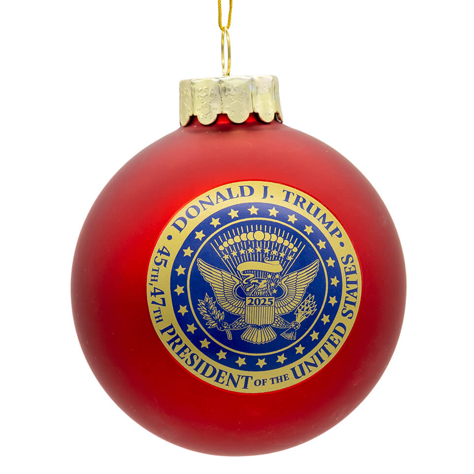 Red glass trump ball ornament with gold blue presidential seal from glass trump ball commemorative collection by kurt adler