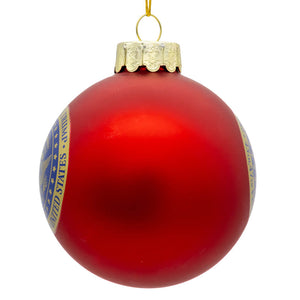 Glossy red glass trump ball ornament with gold cap and blue white us seal band kurt adler ornament