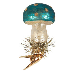 A teal and gold glittery glass vintage mushroom ornament with metallic clip perfect for valentine’s day ornaments