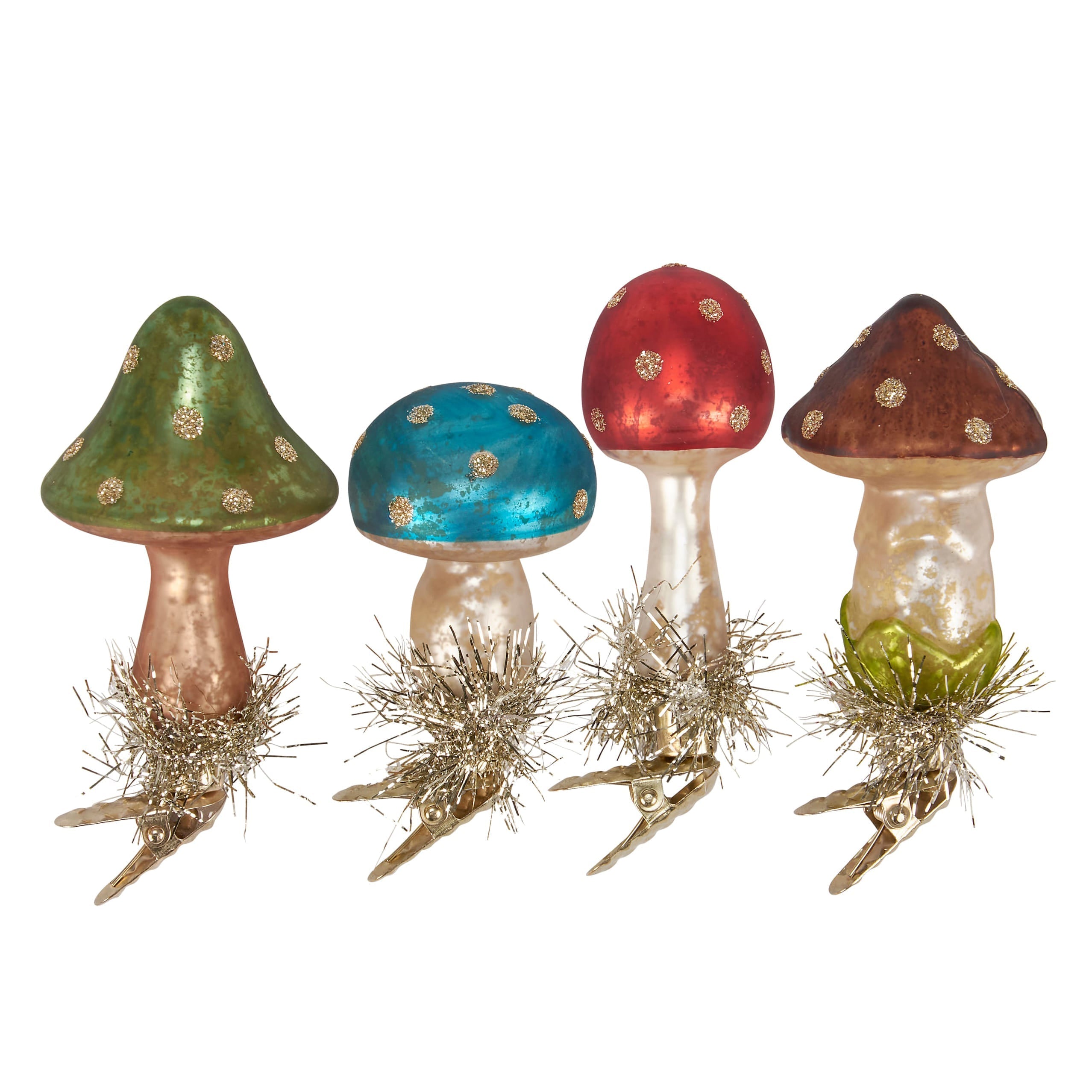 Four colorful glass vintage mushroom valentine’s day ornaments with glitter dots metallic stems and gold tinsel bases