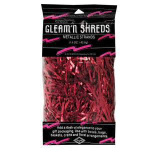 A bag of gleam n shreds metallic red tinsel strands featuring shiny red tinsel strands in metallic finish