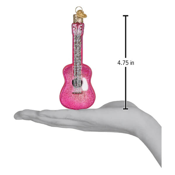 A pink glittery glam guitar ornament by old world christmas with gold hanging loop and detailed strings music ornament