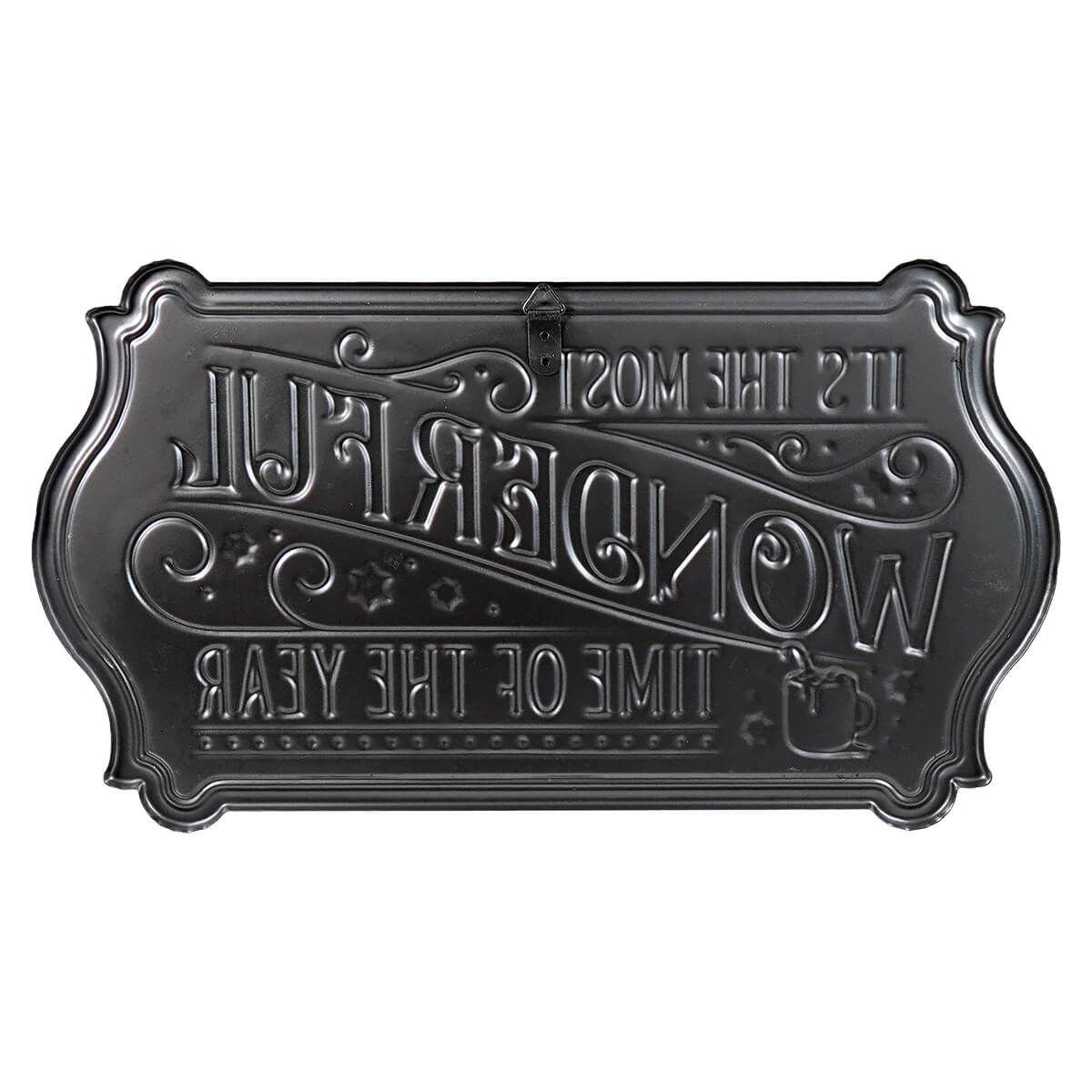 Ornate metal plaque with reversed text reading ’It’s the most wonderful time of the year’.