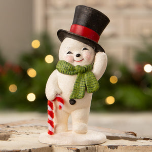 A charming white snowman figurine from bethany lowe design wearing a top hat and scarf holding a candy cane mr frost