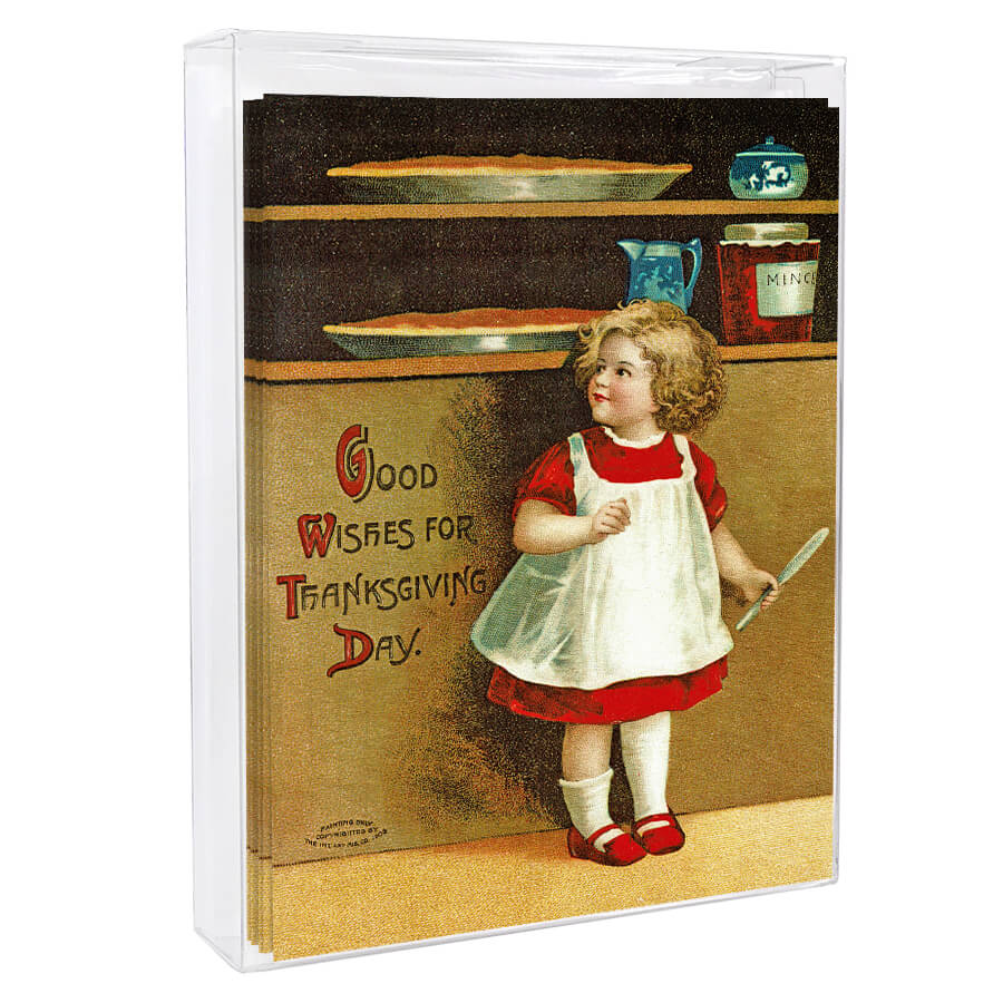 Vintage Thanksgiving greeting card featuring a young child in a red dress and white apron.