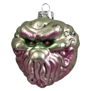 A glossy iridescent glass ornament shaped like a kraken with silver and pink hues by kurt adler gorenaments lou
