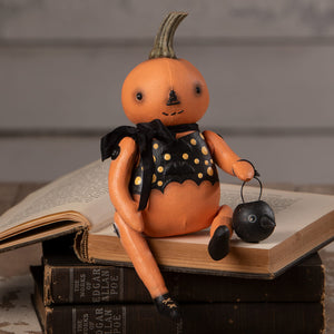 Orange pumpkin sitter figurine by bethany lowe halloween figures wearing black polka-dot dress and holding lantern